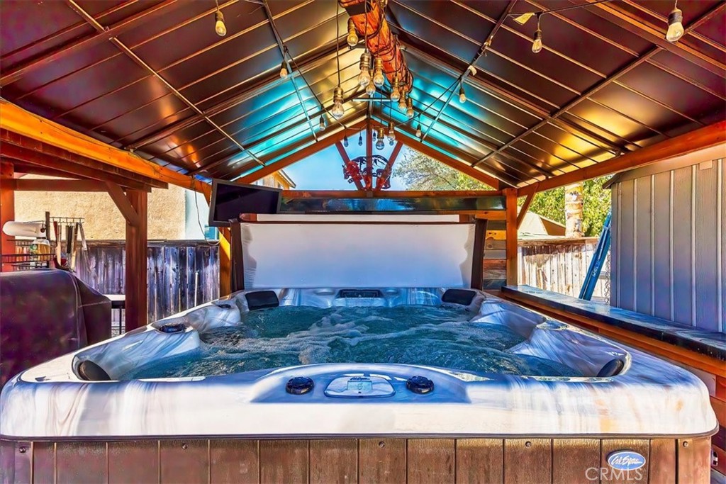 31982 Genoa Street Winchester, CA 92596 - Photo 45 of 49 Sparkling clean soothing hot tub. Approximately 5 years new. Covered gazebo adds extra privacy or can be easily removed.
