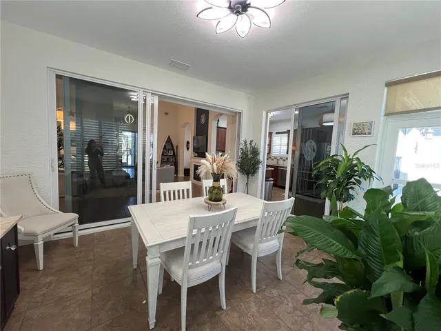 a kitchen with granite countertop stainless steel appliances and wooden cabinets