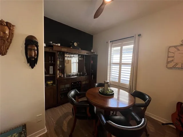 a work room with furniture and rug