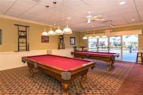 24401 Manchester Trail Port Charlotte, FL 33980 - Photo 34 of 47 a room with pool table and windows