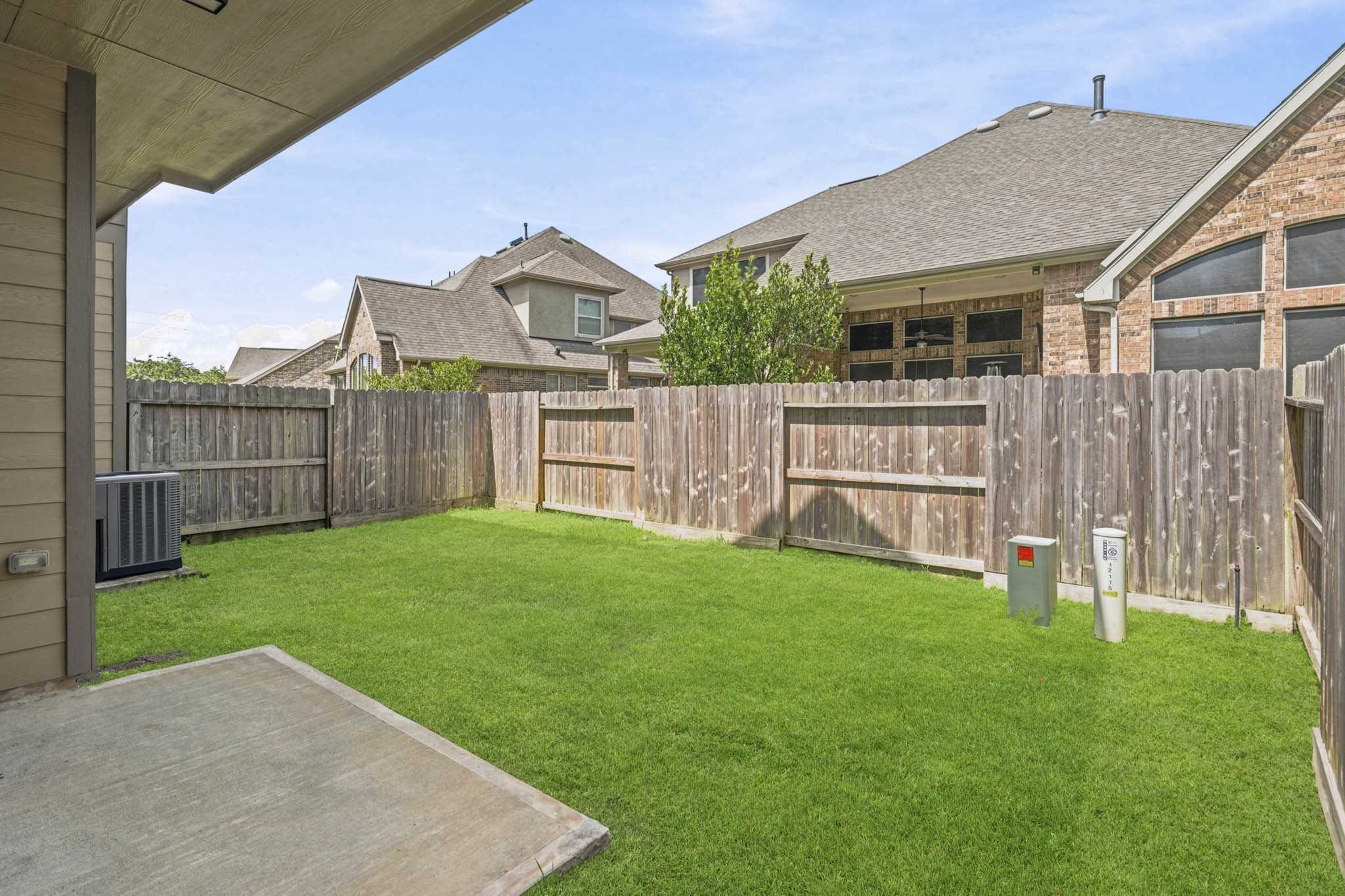 12115 San Luca Street Richmond, TX 77406 - Photo 31 of 44 The fully fenced backyard offers a blank canvas for your outdoor dreams. Whether it's a play area, grilling station, or a tranquil garden, there's plenty of opportunity to make it your own.