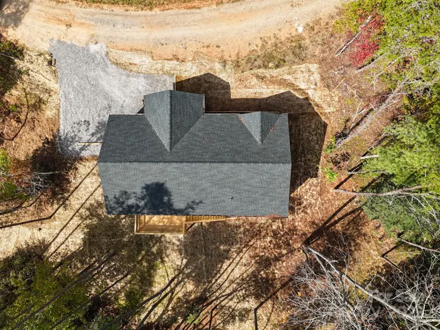 a view of roof with sitting area