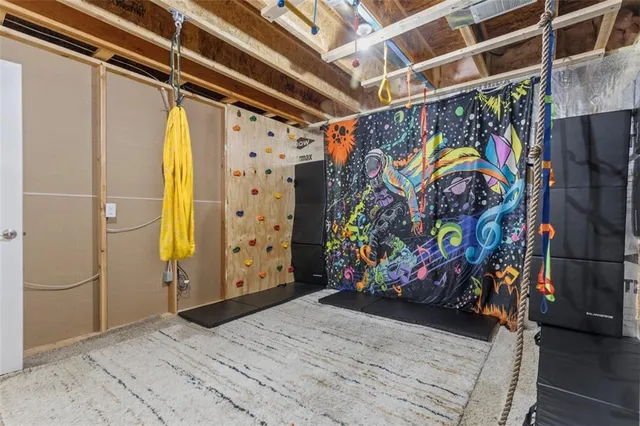 a bedroom with a bed and a cabinets