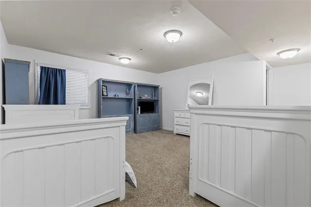 a view of a deck with furniture and wooden floor