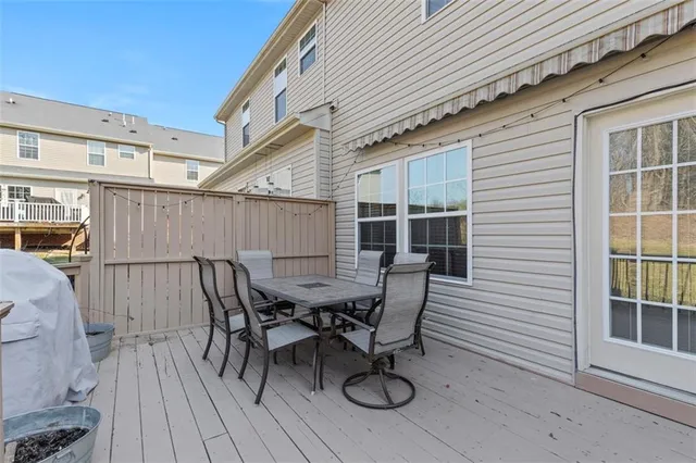 a view of a chairs and table on the wooden floor
