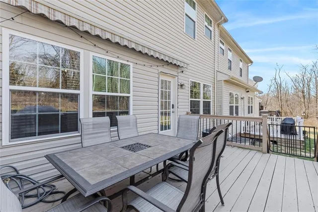 a view of a yard with large trees