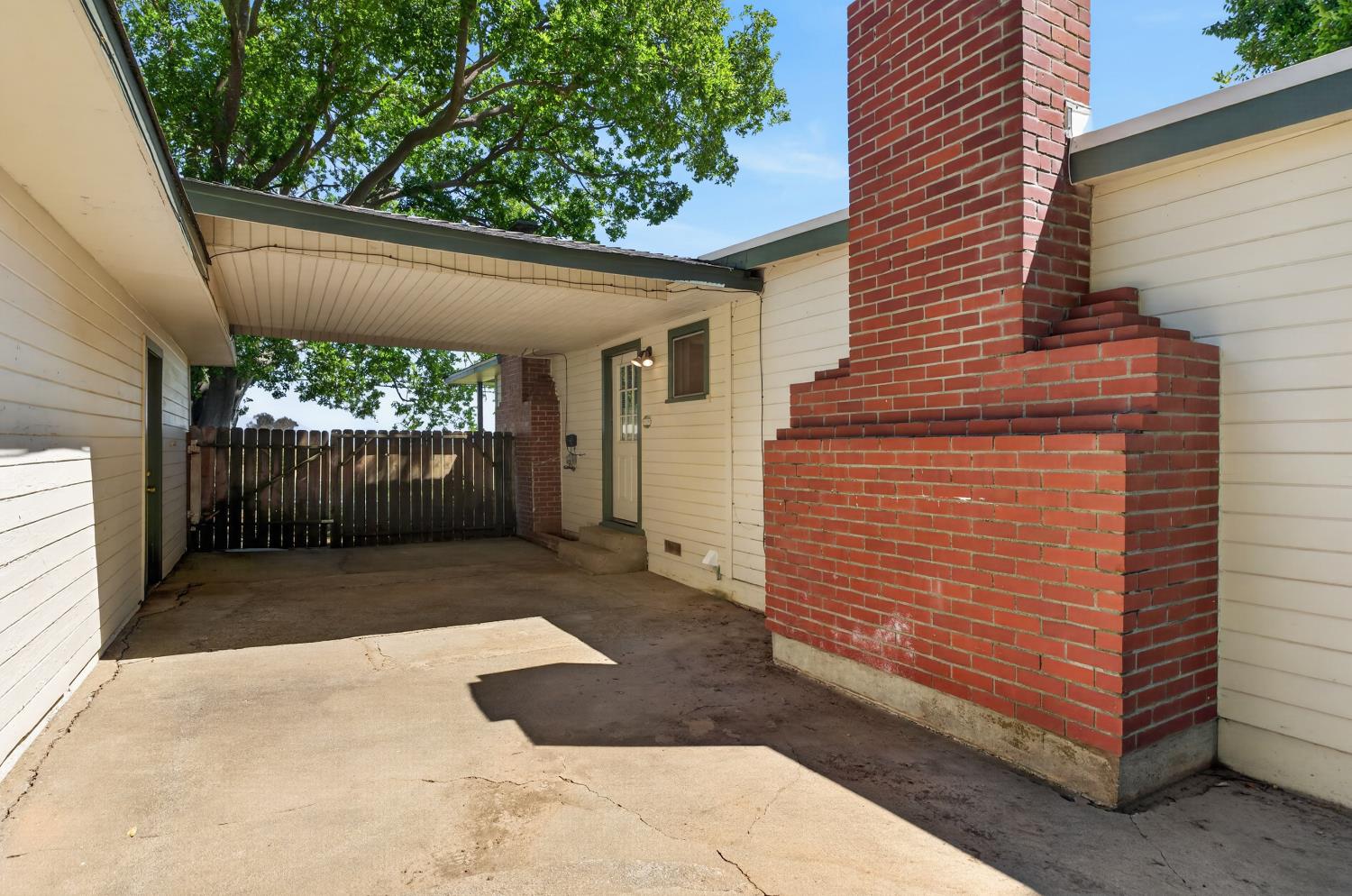10700 Calvine Road Elk Grove, CA 95830 - Photo 46 of 73 a view of a backyard with a garden