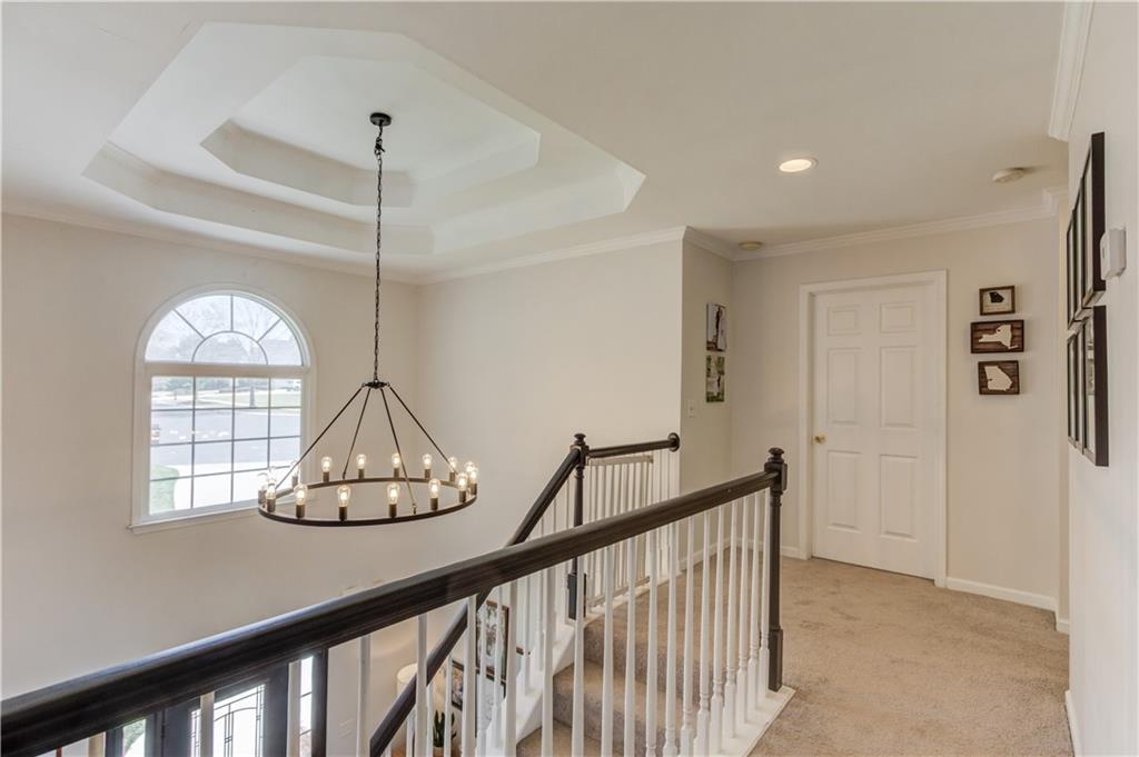 2310 Olde Hickory Place Monroe, GA 30656 - Photo 17 of 46 a view of wooden floor chandelier and entryway