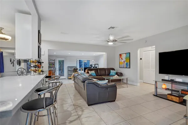 a kitchen with a table and chairs