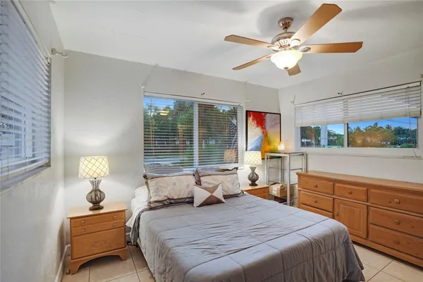 a kitchen with stainless steel appliances granite countertop a refrigerator and a stove