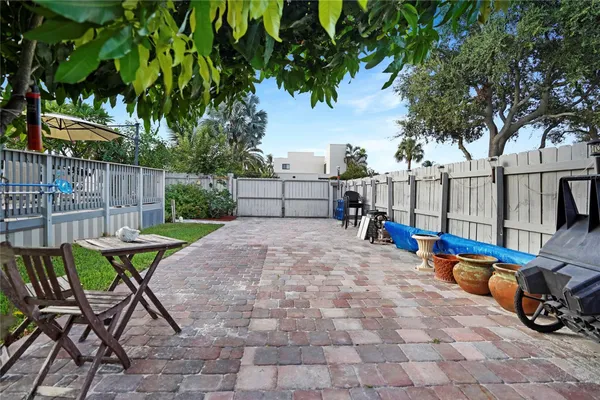a bedroom with a bed and flat screen tv