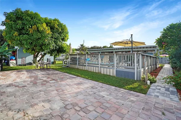 a bathroom with a toilet a sink and a mirror