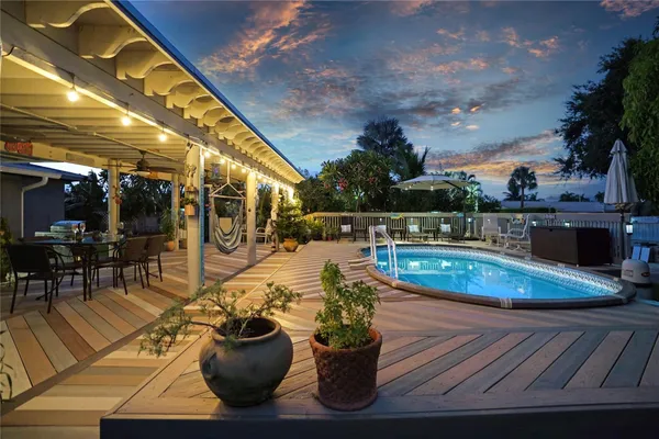 a view of swimming pool with a yard