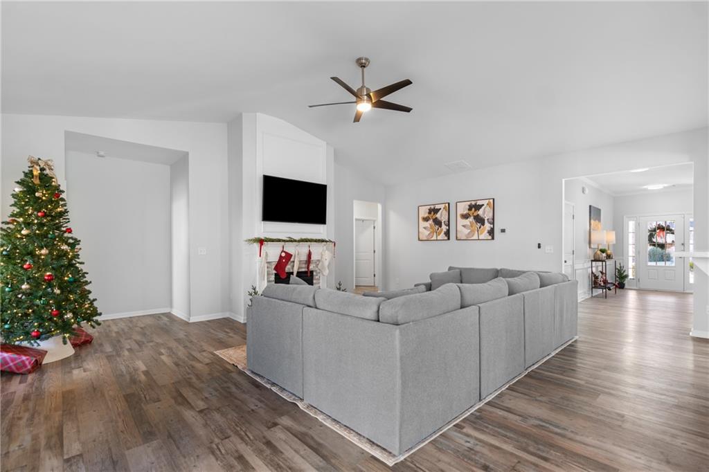 2190 Leatherstone Drive Powder Springs, GA 30127 - Photo 13 of 38 a living room with furniture and a flat screen tv