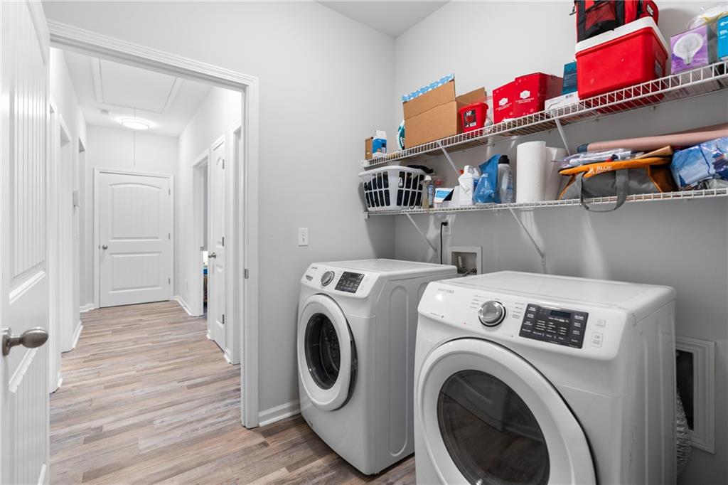 2190 Leatherstone Drive Powder Springs, GA 30127 - Photo 26 of 38 a view of storage and utility room with washer and dryer