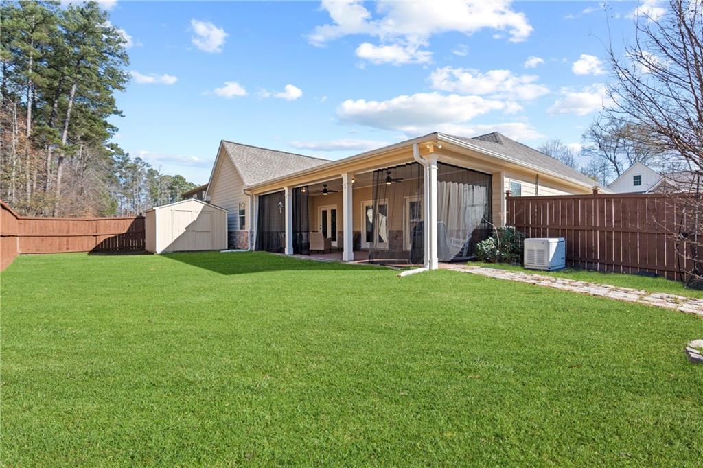 2190 Leatherstone Drive Powder Springs, GA 30127 - Photo 28 of 38 a front view of house with yard and green space