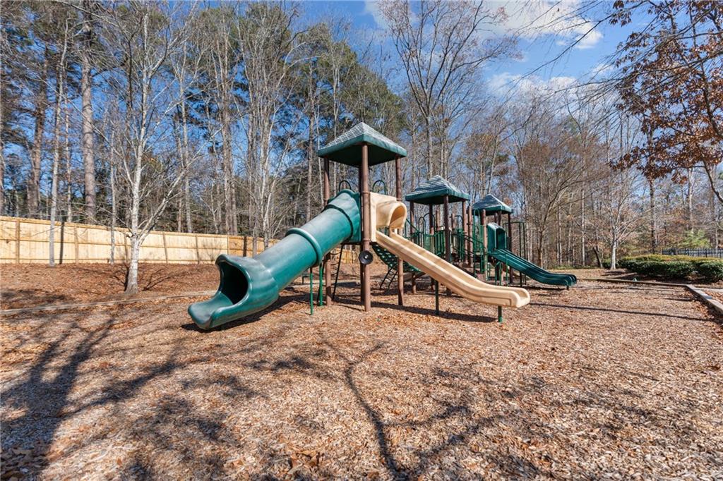 2190 Leatherstone Drive Powder Springs, GA 30127 - Photo 32 of 38 a view of a house with a yard and sitting area