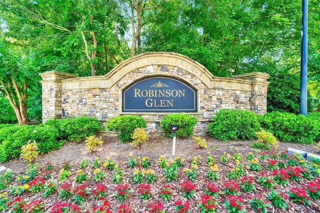 2190 Leatherstone Drive Powder Springs, GA 30127 - Photo 38 of 38 a view of outdoor space with signage and flags