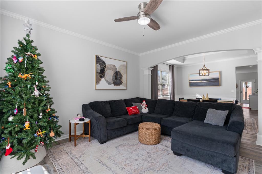 2190 Leatherstone Drive Powder Springs, GA 30127 - Photo 5 of 38 a living room with furniture plant and a potted plant