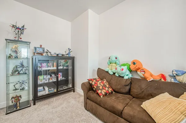 a living room with furniture and a couch