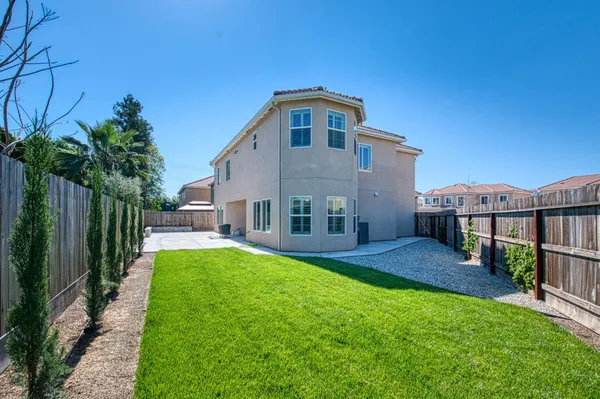 a house view with a garden space