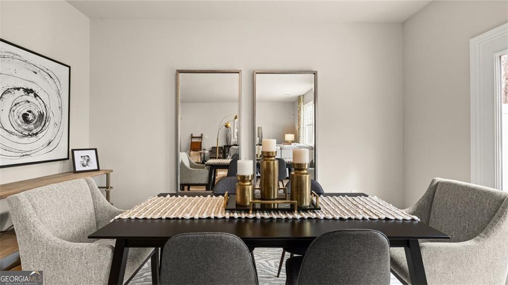 241 Sound Circle Stockbridge, GA 30281 - Photo 36 of 70 a view of a dining room with furniture