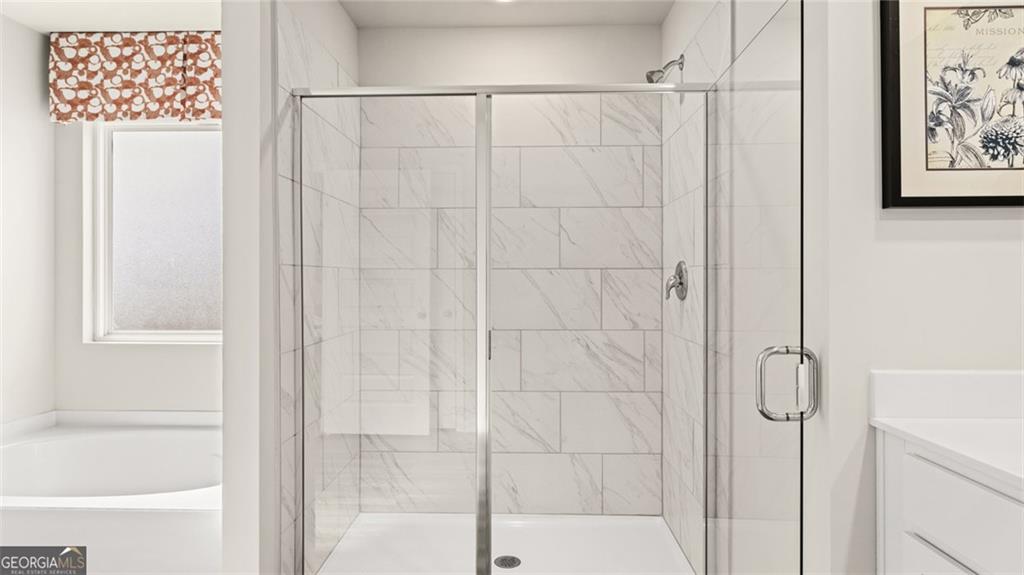 241 Sound Circle Stockbridge, GA 30281 - Photo 53 of 70 a bathroom with a shower