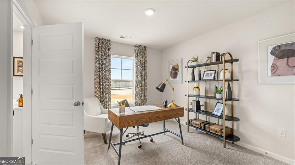 241 Sound Circle Stockbridge, GA 30281 - Photo 70 of 70 a view of a workspace with furniture and a window