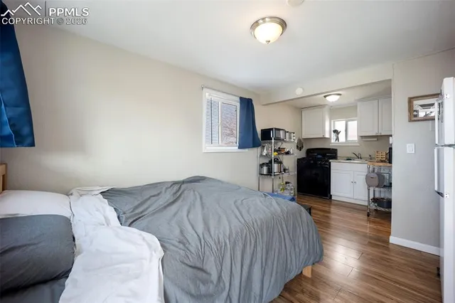 a kitchen with stainless steel appliances granite countertop a refrigerator sink and cabinets