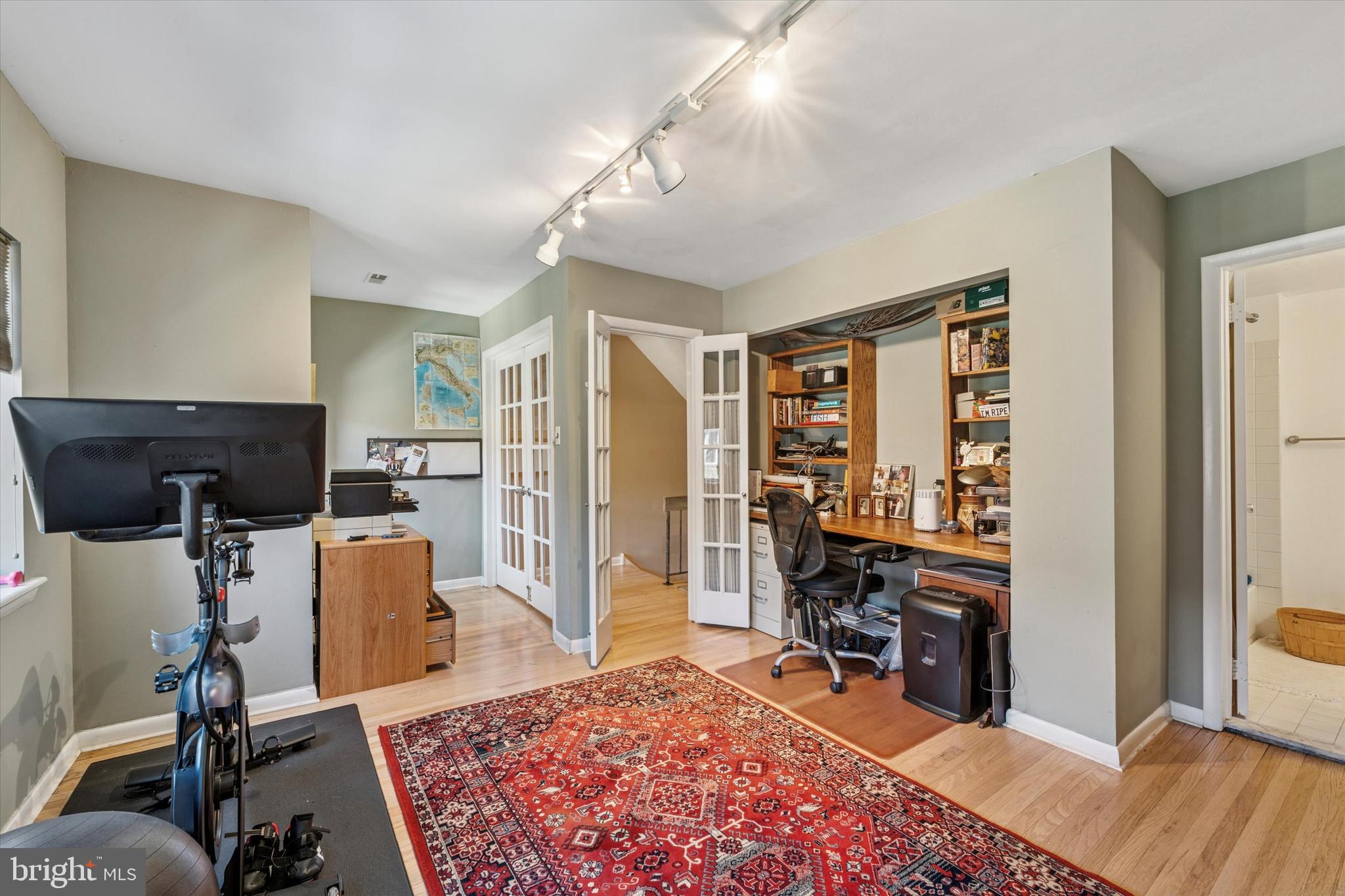 1 Christian Street, Unit 8 Philadelphia, PA 19147 - Photo 15 of 17 a view of a livingroom with workspace and a window