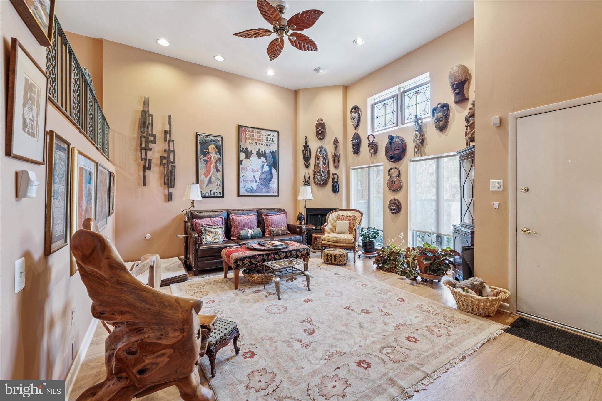 1 Christian Street, Unit 8 Philadelphia, PA 19147 - Photo 2 of 17 a living room with furniture and large windows