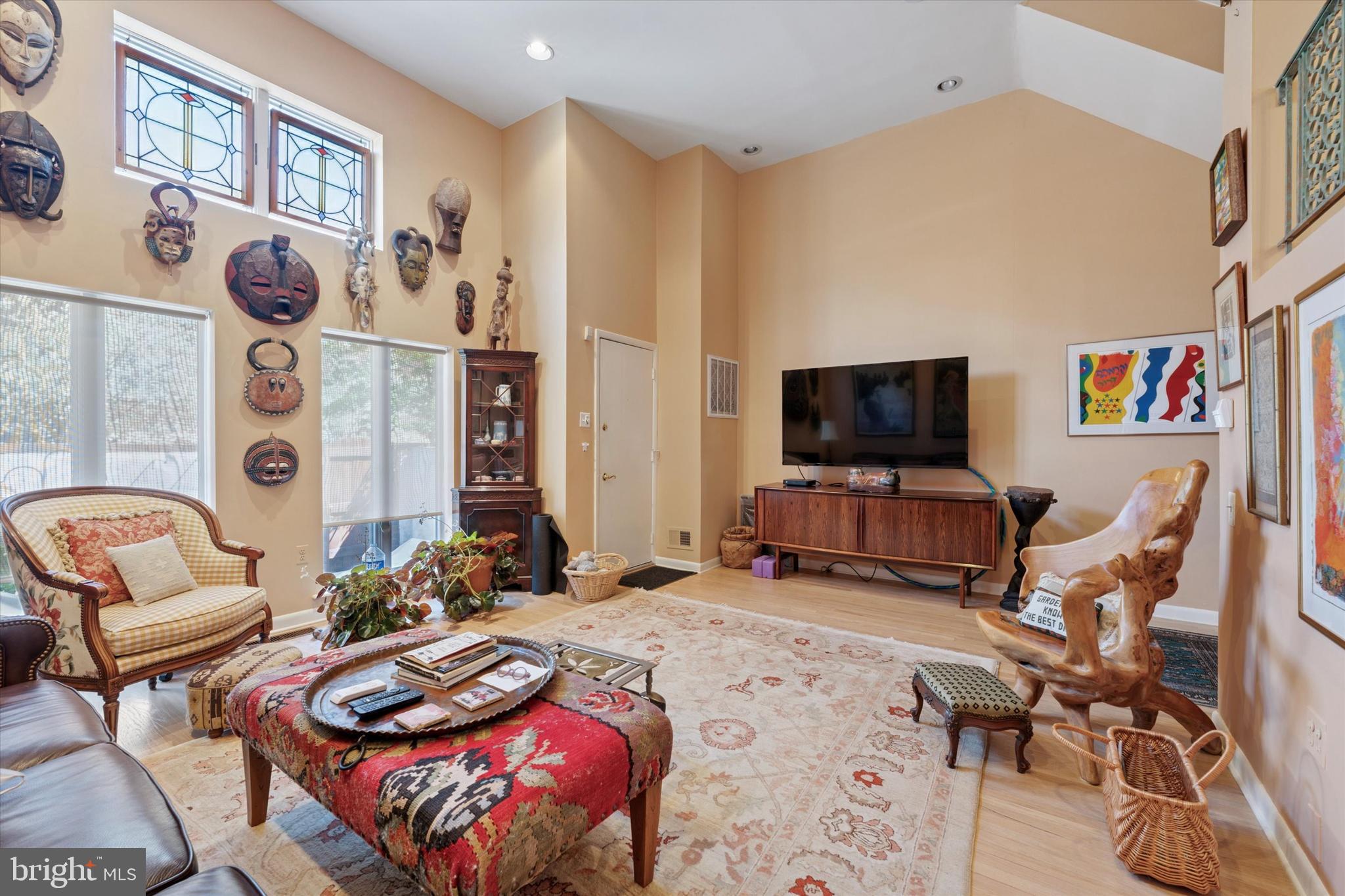 1 Christian Street, Unit 8 Philadelphia, PA 19147 - Photo 3 of 17 a bedroom with furniture and a flat screen tv