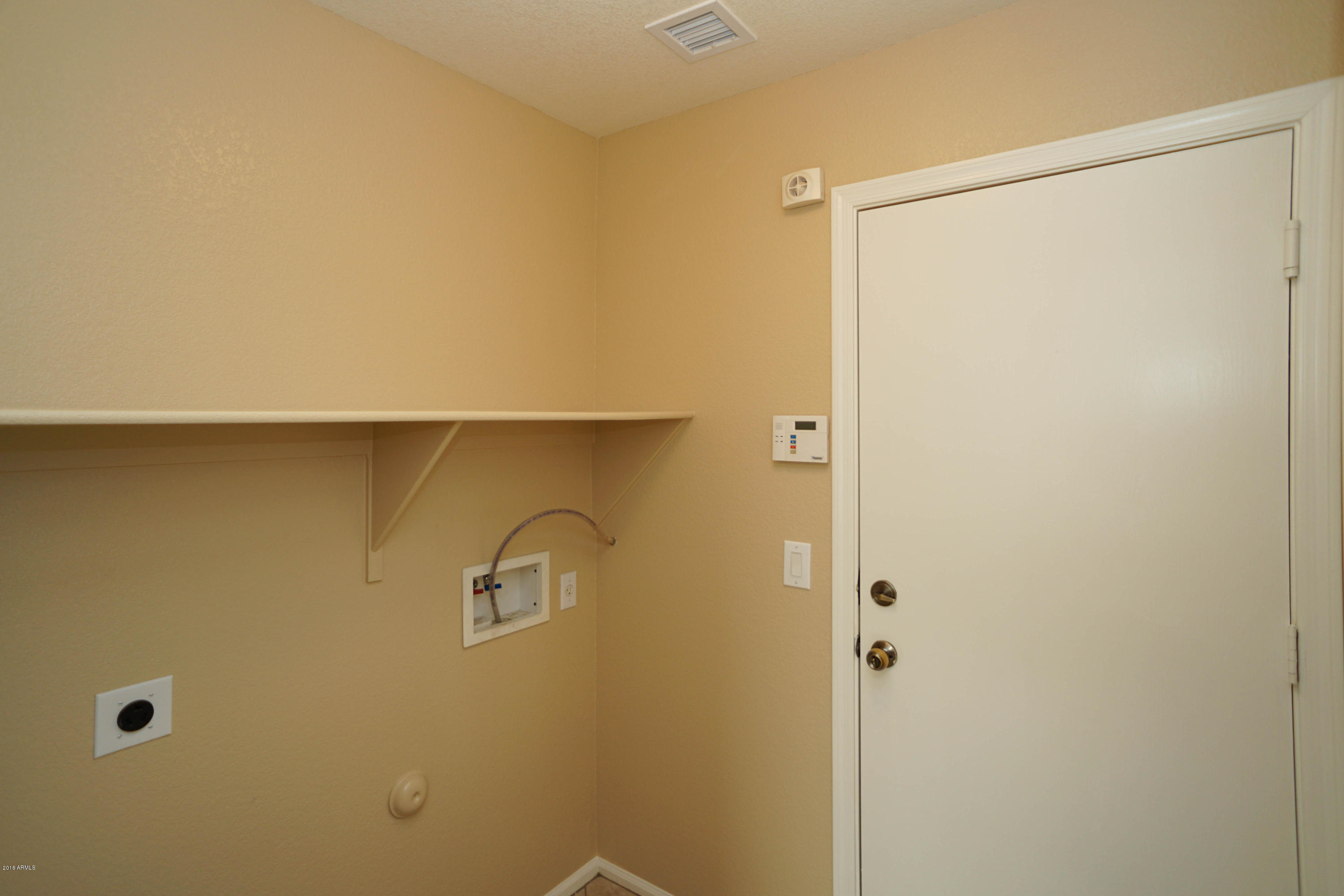837 Mountain View Road San Tan Valley, AZ 85143 - Photo 32 of 40 Spacious Laundry Room