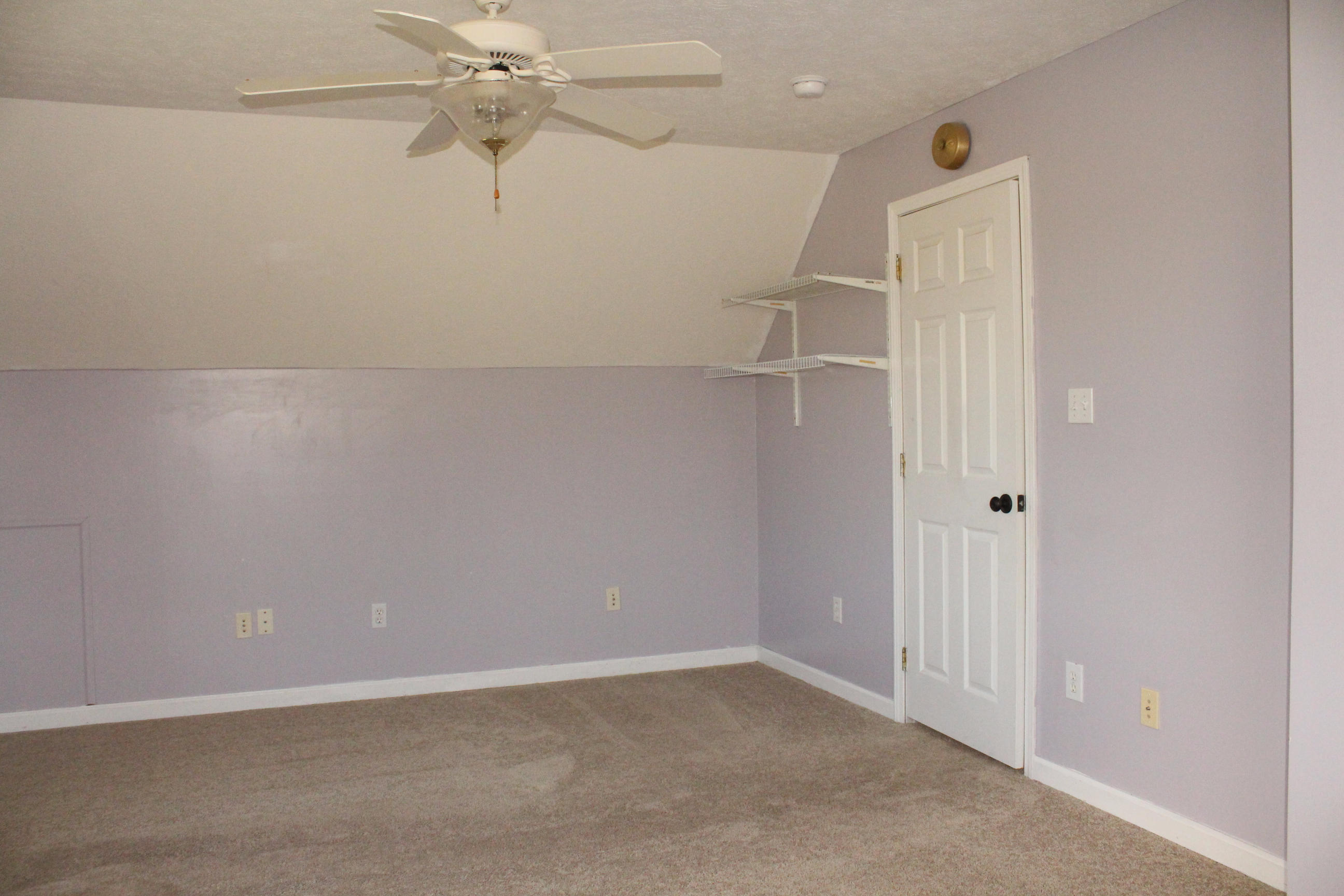 2670 Old Rte 100 Draper, VA 24324 - Photo 20 of 37 an empty room with a ceiling fan and a window