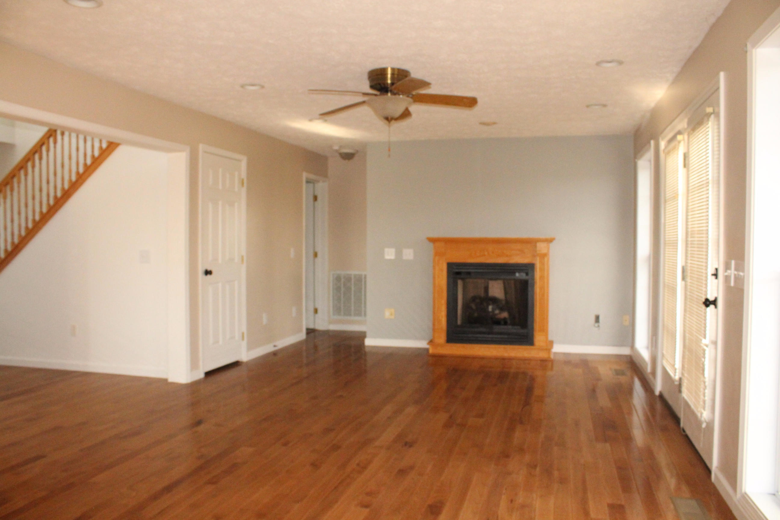2670 Old Rte 100 Draper, VA 24324 - Photo 3 of 37 a view of an empty room with a window and wooden floor
