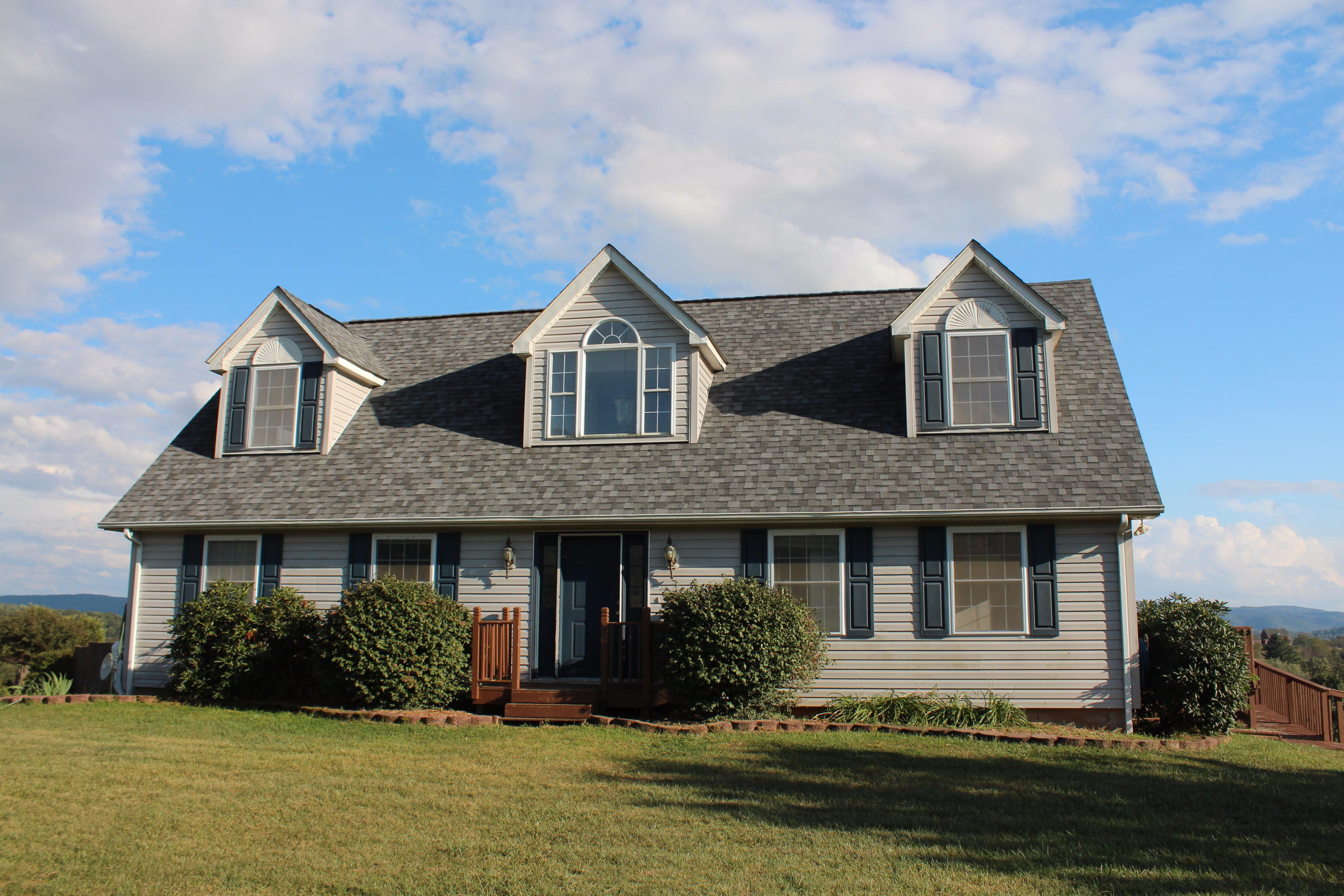2670 Old Rte 100 Draper, VA 24324 - Photo 32 of 37 a front view of a house with a yard