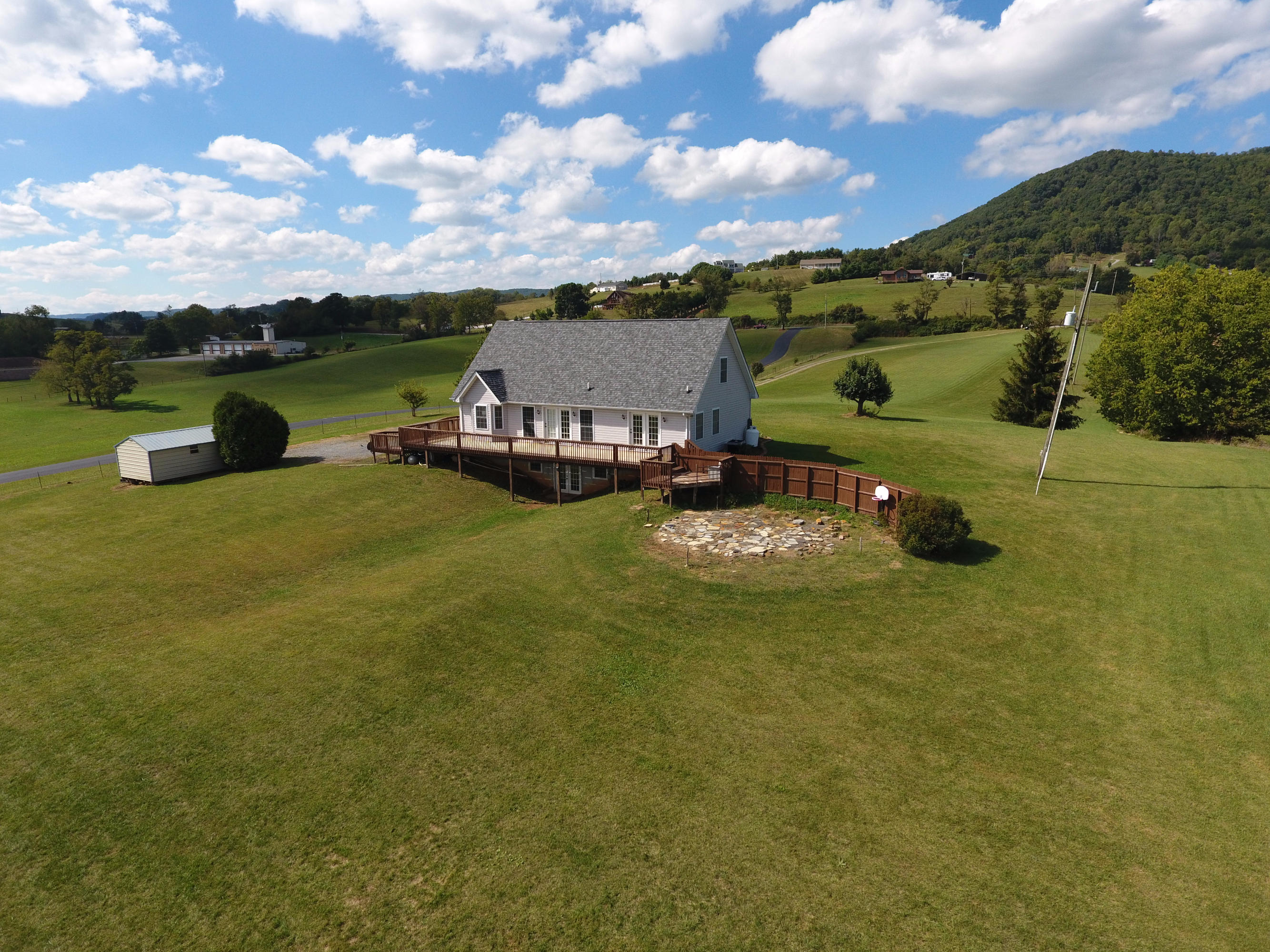 2670 Old Rte 100 Draper, VA 24324 - Photo 36 of 37 a view of a lake with houses in the background