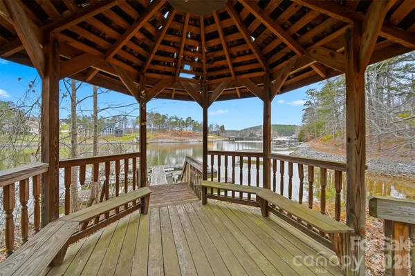 a view of porch with wooden floor