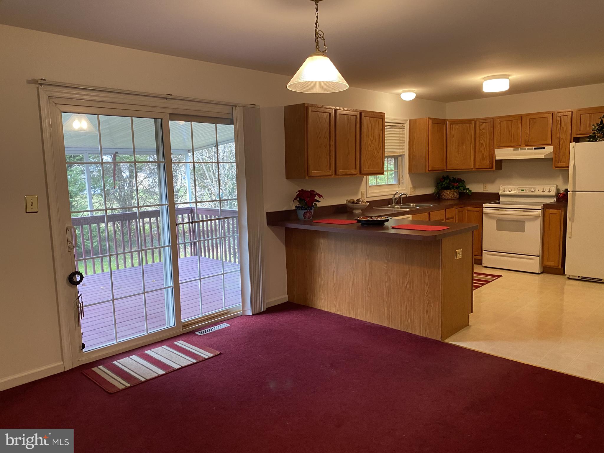 644 Quaker Hill Road Magnolia, DE 19962 - Photo 7 of 22 Dining area opens to sliding door to deck