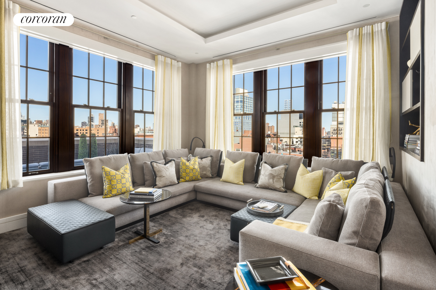 224 Mulberry Street, Unit PH Manhattan, NY 10012 - Photo 8 of 37 a living room with furniture and a large window