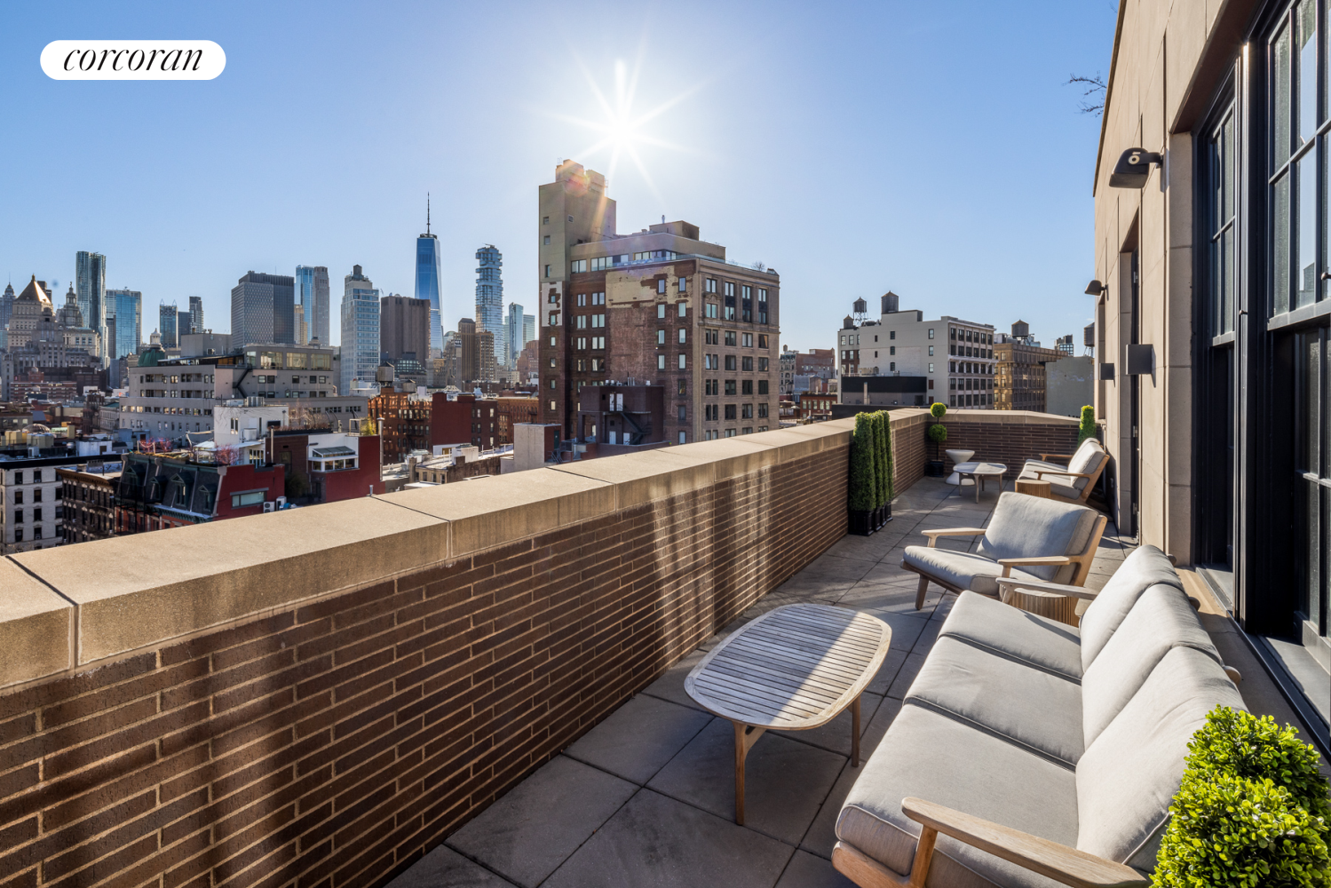 224 Mulberry Street, Unit PH Manhattan, NY 10012 - Photo 9 of 37 a view of roof deck with outdoor seating and city view