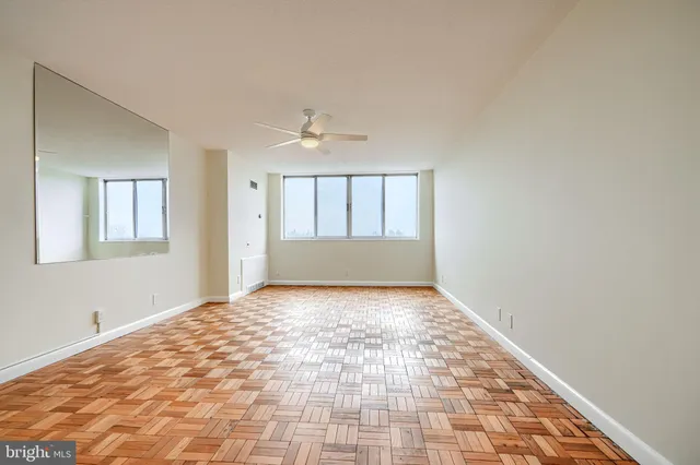 a view of an empty room and window