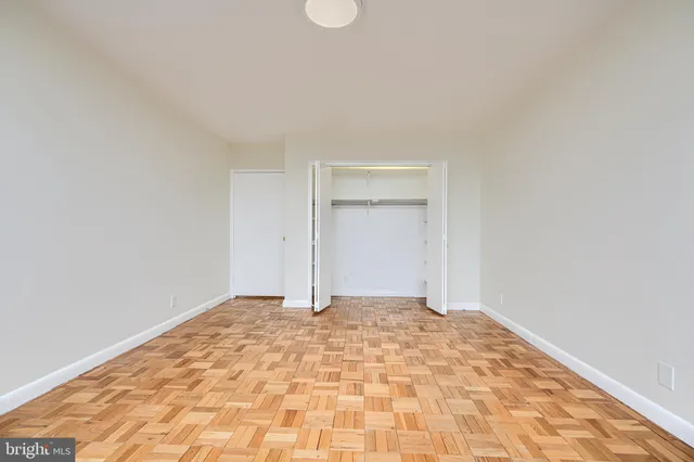 a bathroom with a double vanity sink and mirror