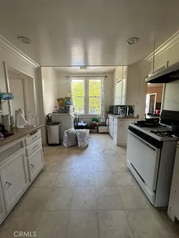 a large white room with a large window