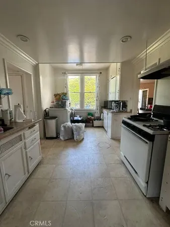 a large white room with a large window