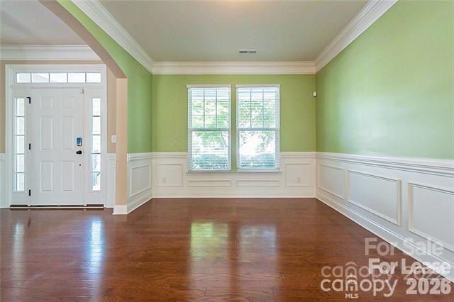 2003 Fallondale Road Waxhaw, NC 28173 - Photo 10 of 31 a view of an empty room with a window and wooden floor