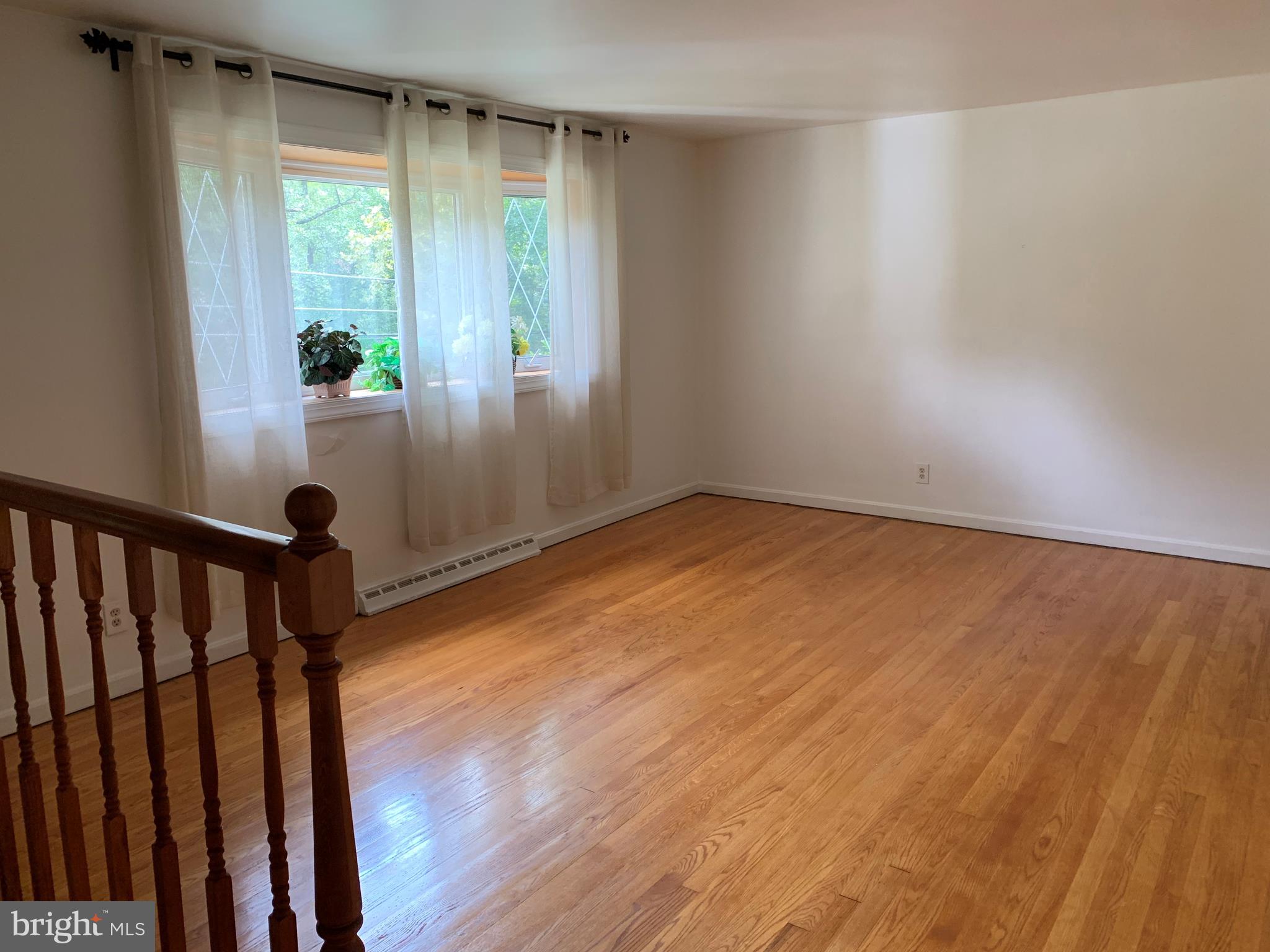 5317 Tolson Road Temple Hills, MD 20748 - Photo 2 of 23 LIVING ROOM WITH HARDWOOD FLOOR