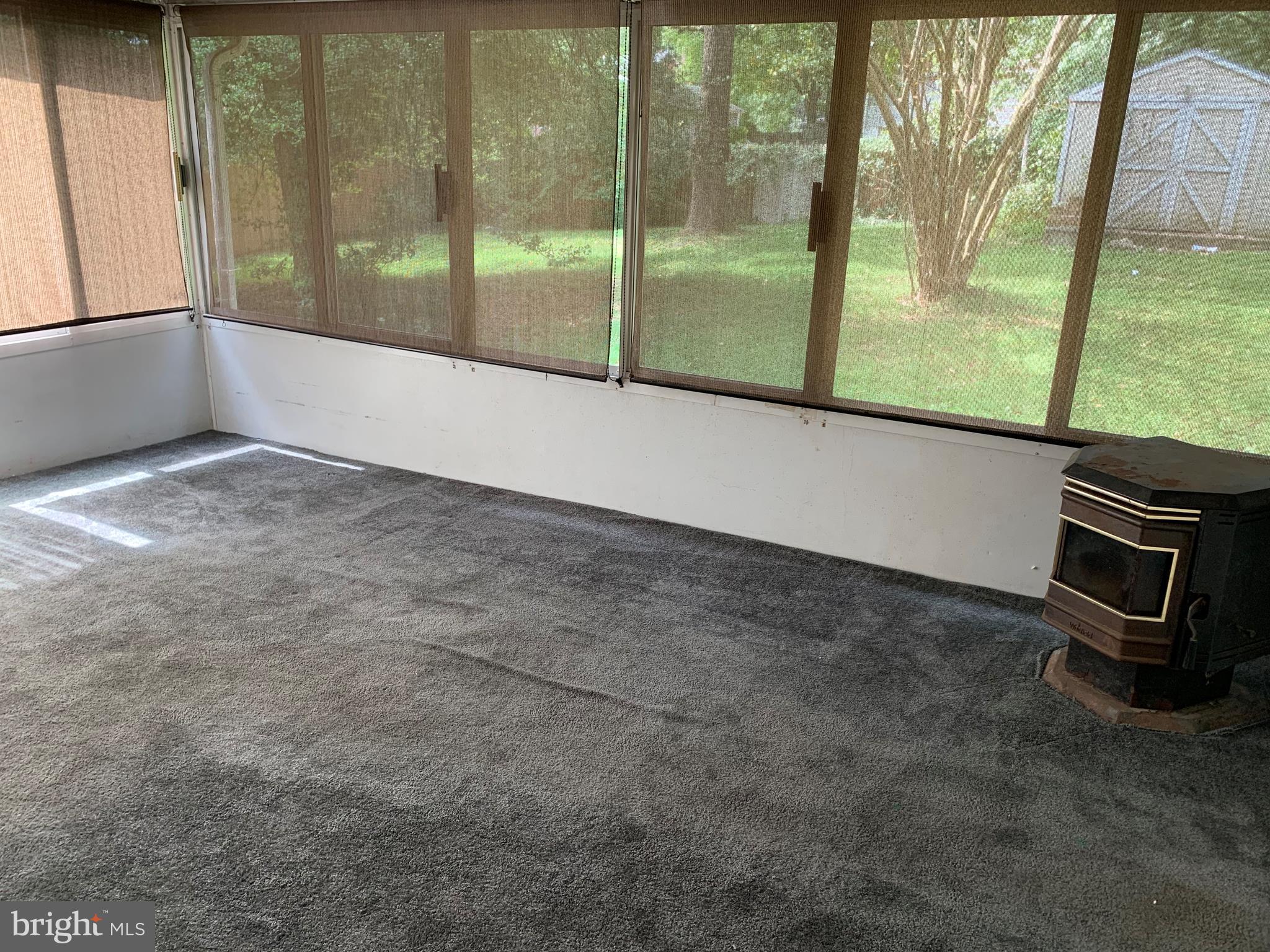 5317 Tolson Road Temple Hills, MD 20748 - Photo 14 of 23 VIEW OF SCREENED IN SUNROOM