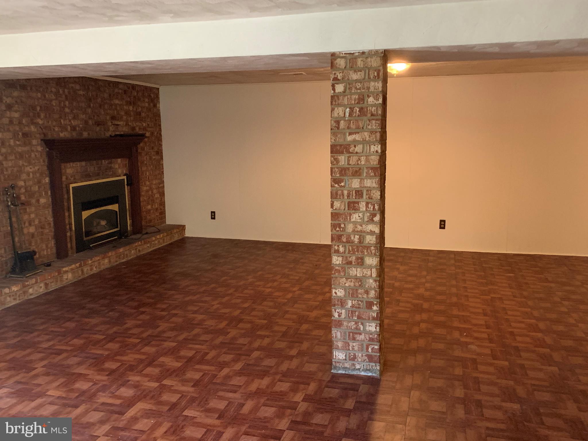 5317 Tolson Road Temple Hills, MD 20748 - Photo 18 of 23 BRICK GAS FIRPLACE IN FAMILY ROOM
