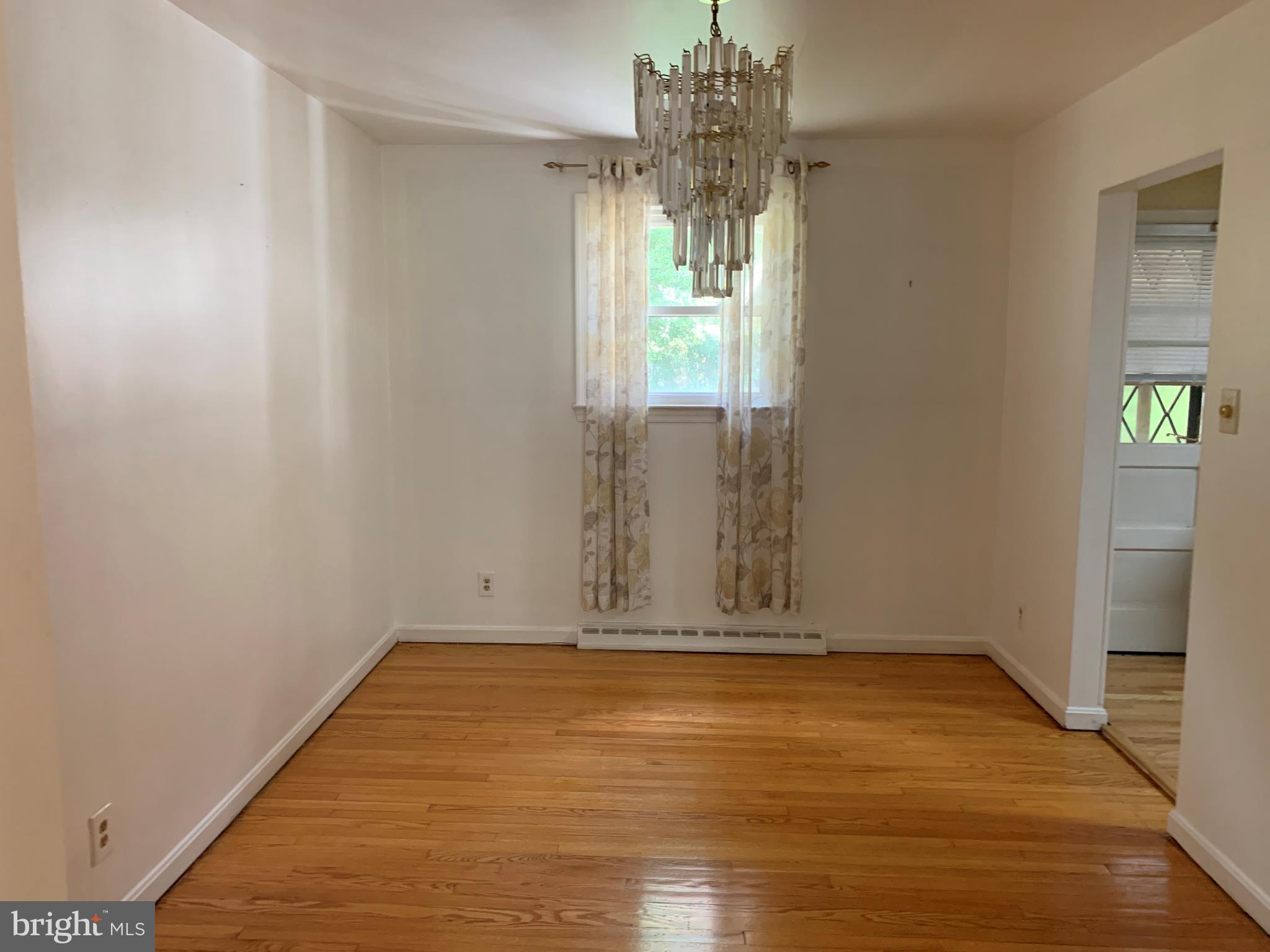5317 Tolson Road Temple Hills, MD 20748 - Photo 4 of 23 SEPARATE DINING ROOM WITH HARDWOOD FLOOR